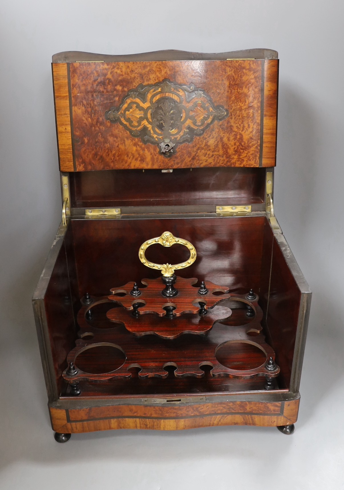A 19th century French amboyna liqueur cabinet, 27cms high.